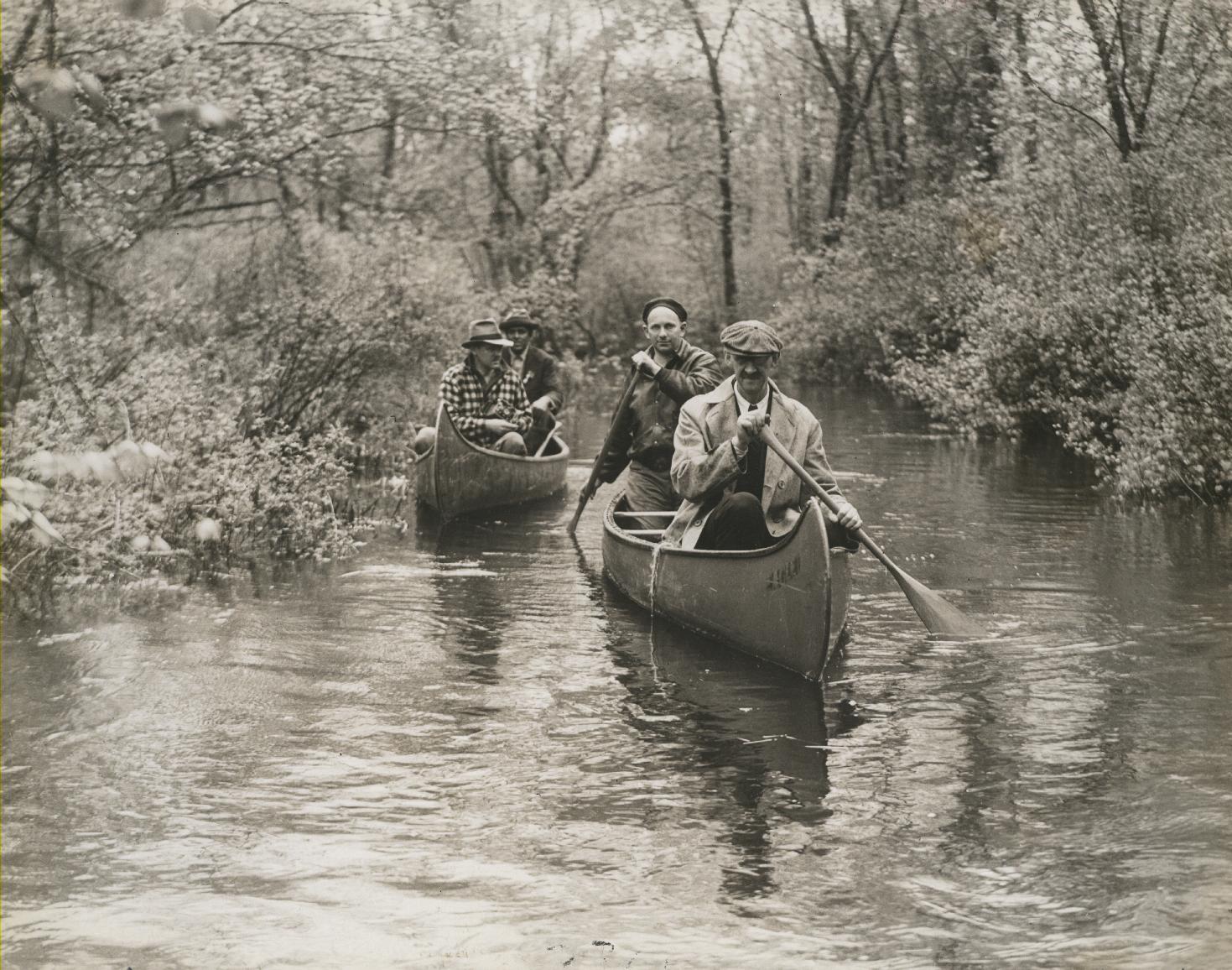 Men canoeing, circa 1948